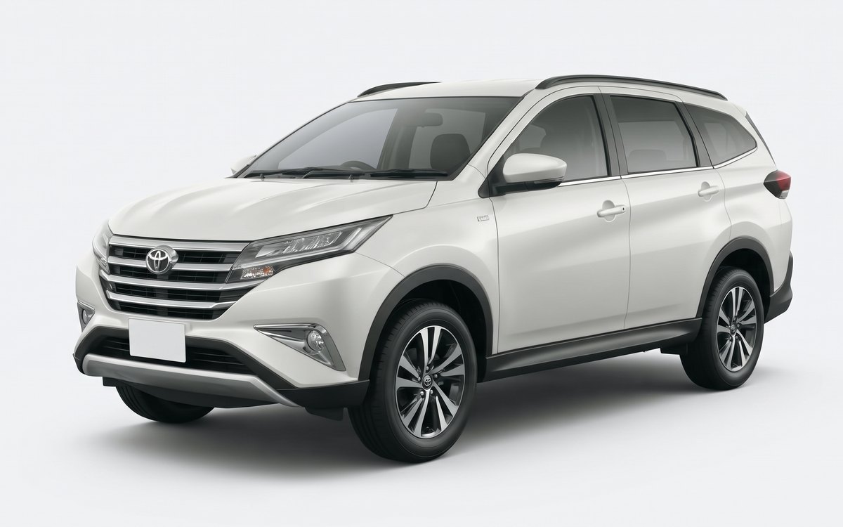 Toyota Rush putih tampak samping